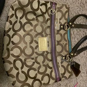 Used brown with purple stripe coach purse